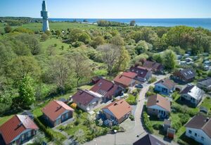 Feriendorf Südstrand – Sonne, Strand & Sauna – Lütt Strandhuus Pelzerhaken mit Kamin und Garten
