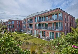 Apartmentvilla Anna See – Familien-Apartment in Strandnähe mit großer Loggia, zwei Bädern & Sauna im Haus!
