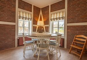 Apparthotel Seehof Lütt Hus – Großes freistehendes Ferienhaus für sechs Personen mit Terrasse und Seeblick