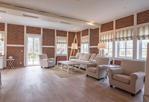 Apparthotel Seehof Lütt Hus – Großes freistehendes Ferienhaus für sechs Personen mit Terrasse und Seeblick