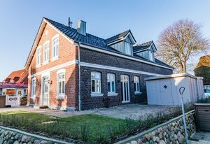 Lokelk Lunhüs Hausteil 2 – "Traumhafte Ferienunterkunft in Oevenum: Entspannung und Abenteuer warten!"