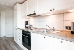 Zur schönen Aussicht, Ferienhaus – Ferienhaus, EG u. DG, 1 Schlafzimmer, Seeblick