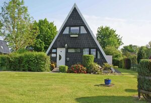 Zeltdachhaus - strandnah - mit Zaun - TV Schlafzimmer – - mit W-LAN