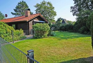 Blockhaus mit W-LAN - grosse Terrasse mit Strandkorb – - mit Zaun in ruhiger Lage