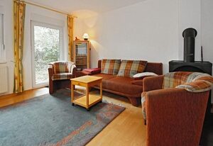 Urlauberdorf – Familienfreundliches, strandnahes Ferienhaus mit Terrasse, Spiel- und Grillplatz