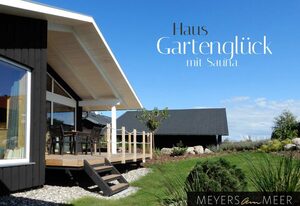 Schwarzes Holzferienhaus an der Ostsee GARTENGLÜCK - Sauna