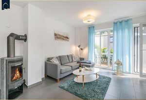 Ferienhaus Möwenkoje – Charmantes Ferienhaus mit Kamin, Terrasse & Garten – Erholung pur im Grünen