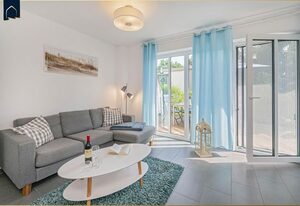 Ferienhaus Möwenkoje – Charmantes Ferienhaus mit Kamin, Terrasse & Garten – Erholung pur im Grünen