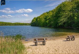 Villa Petra – Gemütliche Ferienwohnung  in Korswandt am See mit Balkon und Seeblick