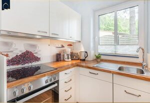 Ferienhaus Waldhaus 5 – Ruhiges Ferienhaus in Korswandt im Grünen – mit Garten, Kamin & Infrarotkabine