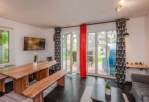 Ferienhaus Kontraste 4m – Haus Kontraste 4m - familiäre Doppelhaushälfte mit Sauna & Kamin