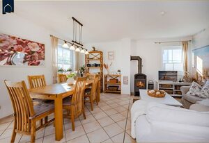 Ferienhaus Golfblick – Modernes Ferienhaus in Korswandt am See mit großem Garten und Kamin