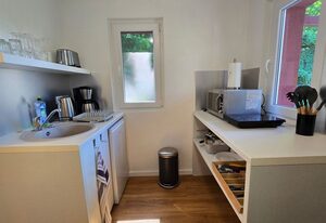 Bungalow Strandheim mit Kamin und Terrasse