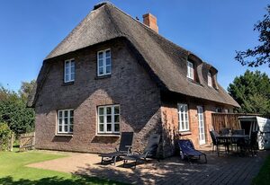 Triibergem 39 - DHH – Ferienhaus in Utersum: 75 m², Garten, 500 m zum Strand, Hunde willkommen