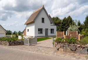 Ferienhaus Sandwelle – Modernes Ferienhaus "Sandwelle" in idyllischer Lage mit Achterwasserblick