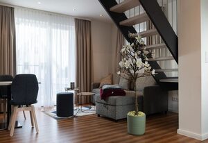Ferienhaus Sandwelle – Modernes Ferienhaus "Sandwelle" in idyllischer Lage mit Achterwasserblick