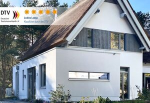 Reethaus Lodino Lodge – Lodino Lodge: 5-Sterne Ferienhaus mit Sauna, Kamin und WLAN für bis zu 6 Gäste