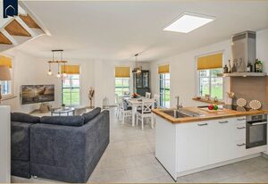 Ferienhaus JoHann – Modernes Ferienhaus im Fischerdorf im Grünen mit Sauna, Garten & Platz für 4 Personen
