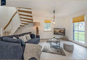 Ferienhaus JoHann – Modernes Ferienhaus im Fischerdorf im Grünen mit Sauna, Garten & Platz für 4 Personen