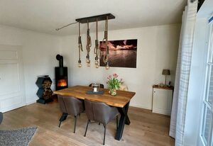 Haus Süüderwoi - Wohnung  3 - EG – Ferienwohnung in Borgsum: Terrasse, Garten, Kamin & Hund erlaubt