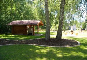 Naturstamm Ferienhaus – Sunrise