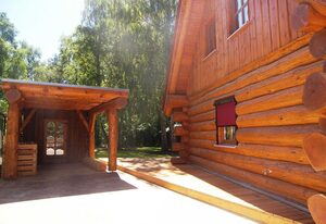 Naturstamm Ferienhaus – Sunrise