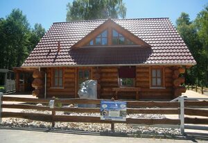 Naturstamm Ferienhaus – Sunrise