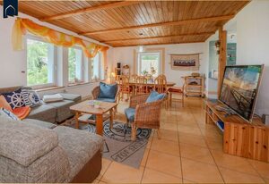 Kreativhaus am See – Freistehendes Ferienhaus in Heringsdorf mit großem Garten & Platz für 8 Gäste
