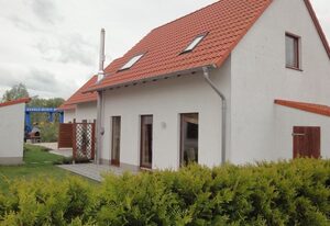 am Wasser mit Terrasse und Kaminofen