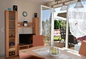 Ferienhaus Amselgarten OFC 03 – Ferienhaus Amselgarten, Terrasse und Garten