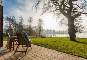 5 Sterne Ferienhaus direkt am See mit Sauna-Kamin-103m² – Ferienhaus Auszeit