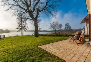 5 Sterne Ferienhaus direkt am See mit Sauna-Kamin-103m² – Ferienhaus Auszeit