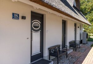 Dünenrose und Tuttelduuv unter Reet, Kamin, Sauna OFC 32 – Reet-Haus XL mit 5 Schlafzimmern, Kamin und Sauna