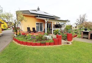 Haus Ostseetraum – 130 m² Ferienwohnung  – 4 SZ, 2 Bäder, Kamin, WLAN  – für bis zu 8 Personen