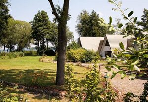DAS HAUS AM SEE - Finnhütten am Schweriner See – Ferienhaus, Dusche, WC, 2 Schlafzimmer, Seeblick