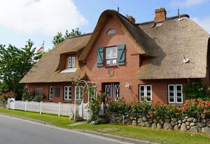 Ferien unterm Reetdach Whg 02