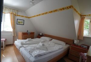 Ferien unterm Reetdach Whg 01