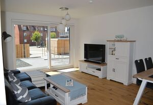 Ferienwohnung Theo's Garten – Ferienwohnung-3-Raum