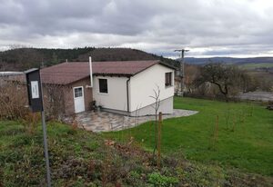 Ferienhaus RhönFlair – Ferienwohnung A mit großzügigem Balkon und Wintergarten