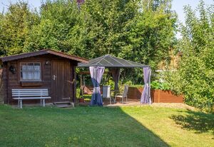 Ferienwohnung Sabine – Geräumige Ferienwohnung mit schönem Garten