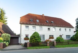 Ferienwohnung Hertel – Ferienwohnung im DG mit Terrasse im Garten