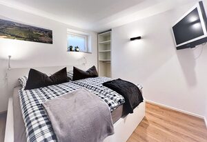 Ferienwohnung Weininsel – Ferienwohnung (75 qm) mit eigener Terrasse