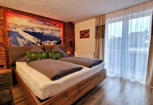Ferienwohnungen Wolf - Wohnung " Eisenberg" 2 Zimmer mit Bergblick