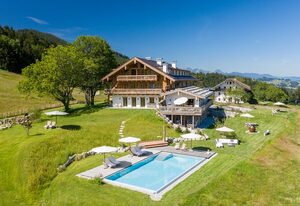 Chiemsee Chalet – Kuschel-Chalet-Suite  mit 40qm, Schlaf-/Wohnraum mit Küche und Bad mit Sauna