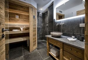 Chiemsee Chalet – Kuschel-Chalet-Suite  mit 40qm, Schlaf-/Wohnraum mit Küche und Bad mit Sauna
