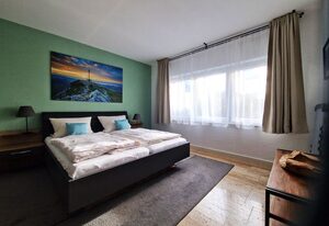 Ferienwohnung Zürcher – Ferienwohnung 60 qm im Untergeschoss/Hanglage mit 1 Schlafzimmer und Terrasse