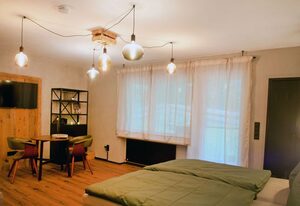 Ferienwohnung Waldgeflüster – 1-Zimmer Appartement am Waldrand mit großer Terrasse