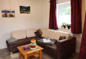 Fasanengarten in Traunreut – Ferienwohnung 55qm mit Balkon und Gartenblick