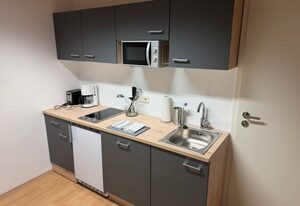 3 Zimmer/ Ruhiges Apartment mit Terrasse: Tor zu den Alpen & München (EG-L)