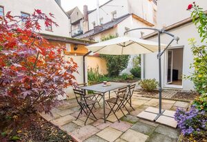 Ferienwohnungen Schmid – Wohnung (70qm) mit kostenfreiem WLAN mit idyllischem Garten